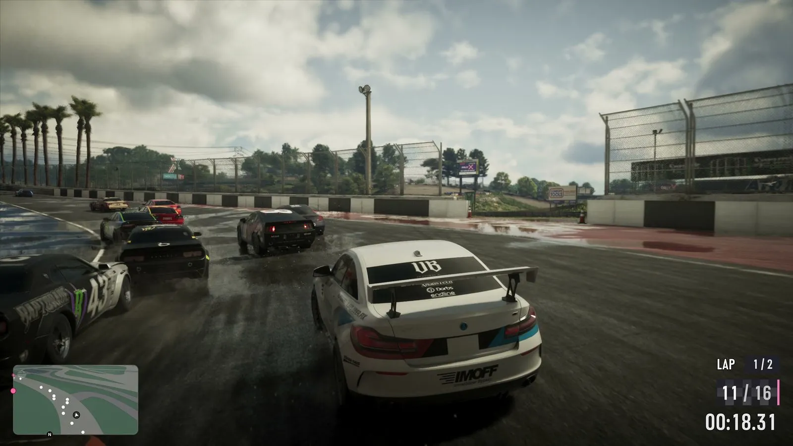 A white race car on a wet circuit in the official GTA 6 Extended Look